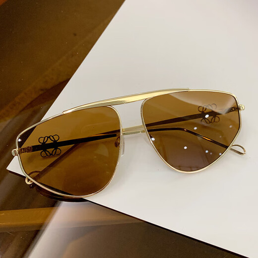 Nuevas gafas de sol de metal para mujeres Gafas de sol Sense Soles Hollow Gafas Hollow Marco Europeo y americano Protección solar de conducción 9898 Doble gris