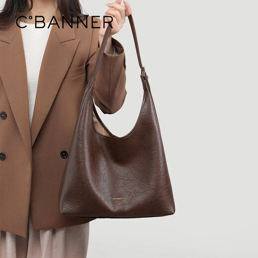 Qianbaidu Cbanner Cowhide Bag Сумка для женской сумки с большой емкостью одно плечо.