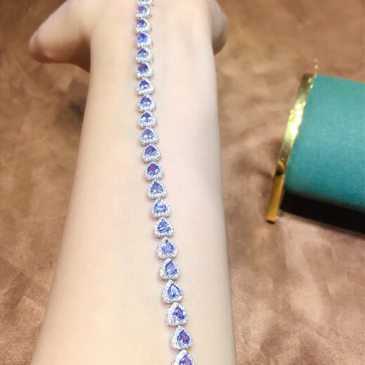 Yixiang natural tanzanite bracelet with alluring purple pure body and sparkling fire. 925 silver precision inlay 4*4mm supports detection. Natural tanzanite bracelet with alluring purple all pure body and sparkling color.