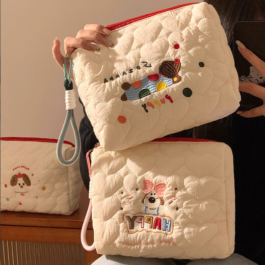 Bolsa de maquillaje de alto valor muxingyu, bolsa de almacenamiento de viaje portátil de gran capacidad, productos para el cuidado de la piel, artículos de tocador, cachorro de coloridos bordados