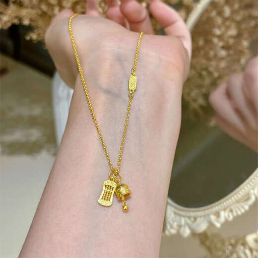 Only a pair of new Chinese style 18k gold Peace Bell Abacus Necklace for girls. Exquisite, compact and luxurious clavicle chain pendant design. Peace Bell Abacus Necklace.