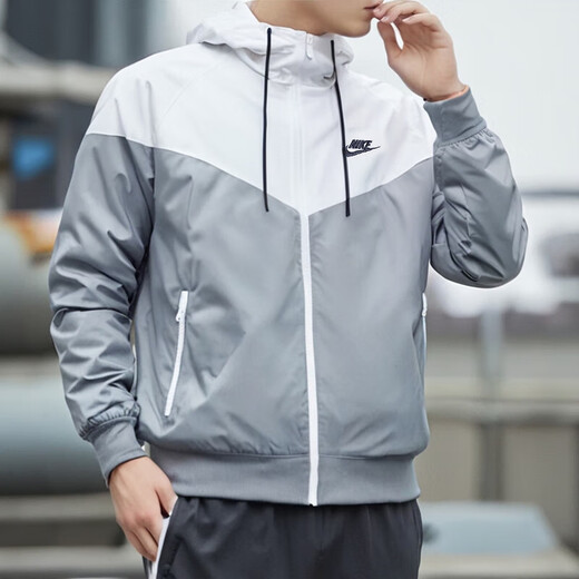 Nike (Nike) Спортивный костюм Мужчина 25 Летний новый ветропроницаемый тканый куртка с капюшоном фитнес. Кратко усугубляющая брюки.