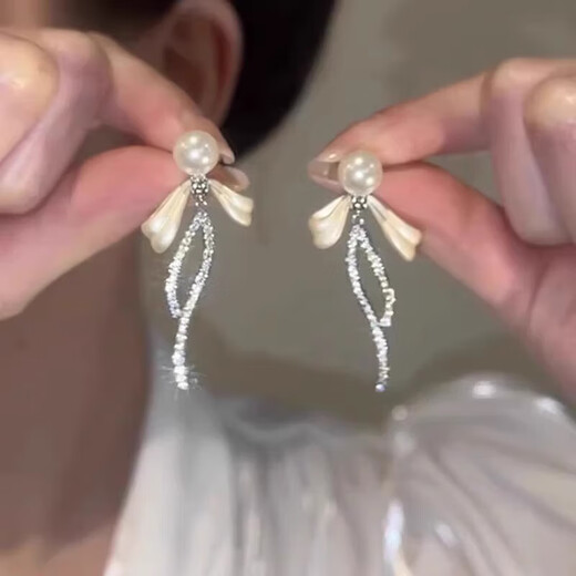 Bai Qixin 925 silver needle bow imitation pearl earrings for women light luxury niche high-end temperament earrings 2025 new earrings bow pearl tassel earrings