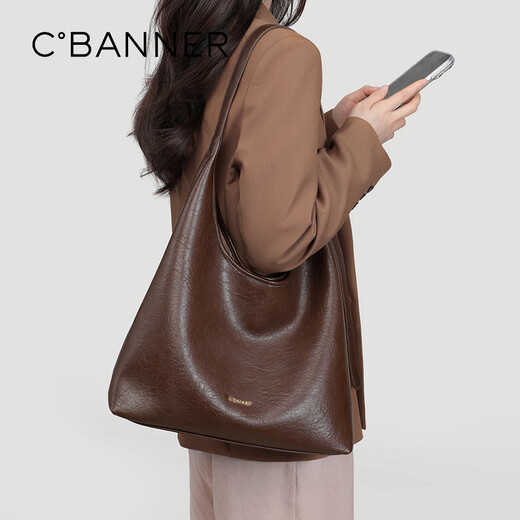 Qianbaidu Cbanner Cowhide Bag Сумка для женской сумки с большой емкостью одно плечо.