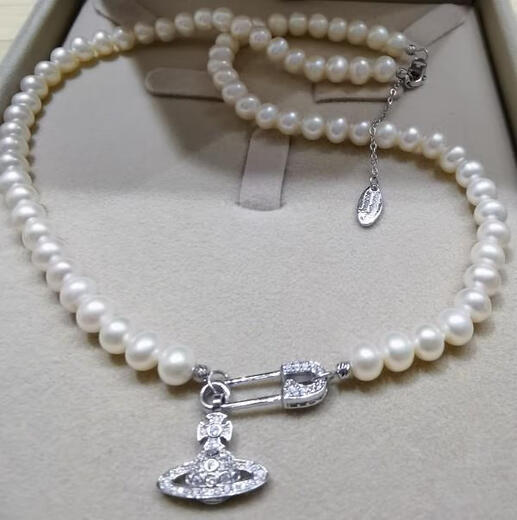 Small universe natural freshwater pearl nearly round necklace age-reducing temperament Saturn clavicle chain egg round s925 sterling silver buckle necklace with minor flaws