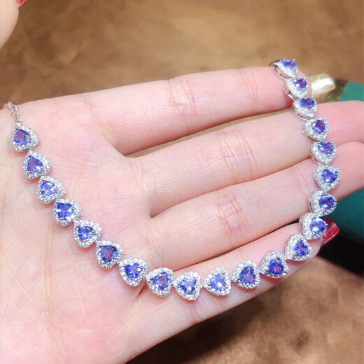 Yixiang natural tanzanite bracelet with alluring purple pure body and sparkling fire. 925 silver precision inlay 4*4mm supports detection. Natural tanzanite bracelet with alluring purple all pure body and sparkling color.
