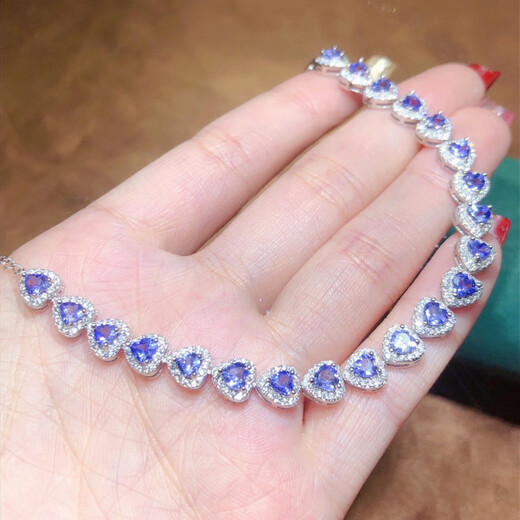 Yixiang natural tanzanite bracelet with alluring purple pure body and sparkling fire. 925 silver precision inlay 4*4mm supports detection. Natural tanzanite bracelet with alluring purple all pure body and sparkling color.