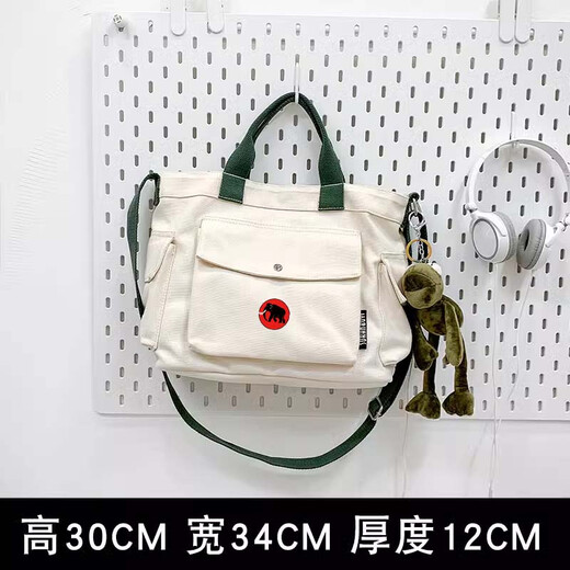 MMOZDXUT Mammoth Men and Women Crossbody Single Shoulder Backpack Canvas Handbag Large Capacity Personalized Casual Trend Brand White [Lotus White] Large With Frog Pendant 1