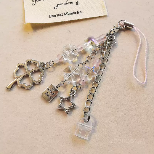 The shopkeeper's four-leaf clover mobile phone dust-proof plug tassel pendant Apple Android type-c charging port dust-proof and waterproof mobile phone accessories type-c/elliptical interface-four-leaf clover tassel pendant