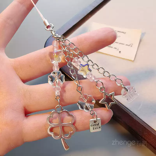 The shopkeeper's four-leaf clover mobile phone dust-proof plug tassel pendant Apple Android type-c charging port dust-proof and waterproof mobile phone accessories type-c/elliptical interface-four-leaf clover tassel pendant