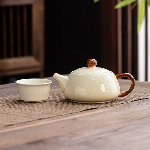 Creative tea set set household ceramic kung fu tea set teapot teacup modern Chinese style simple tea making tools bright yellow brown Xishi pot 1 pot 1 flat cup