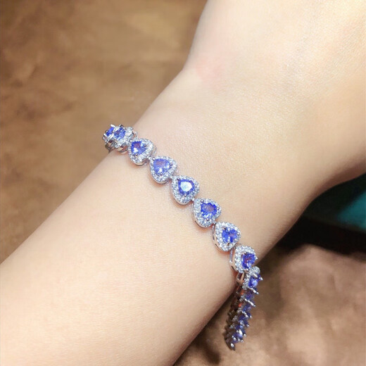 Yixiang natural tanzanite bracelet with alluring purple pure body and sparkling fire. 925 silver precision inlay 4*4mm supports detection. Natural tanzanite bracelet with alluring purple all pure body and sparkling color.