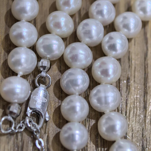 Small universe natural freshwater pearl nearly round necklace age-reducing temperament Saturn clavicle chain egg round s925 sterling silver buckle necklace with minor flaws