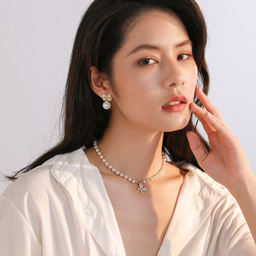 Qlady bow unique earrings earrings for women 2025 new temperament high-end light luxury earrings women's imitation pearl earrings