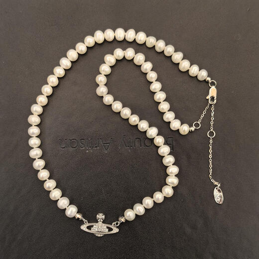 Small universe natural freshwater pearl nearly round necklace age-reducing temperament Saturn clavicle chain egg round s925 sterling silver buckle necklace with minor flaws