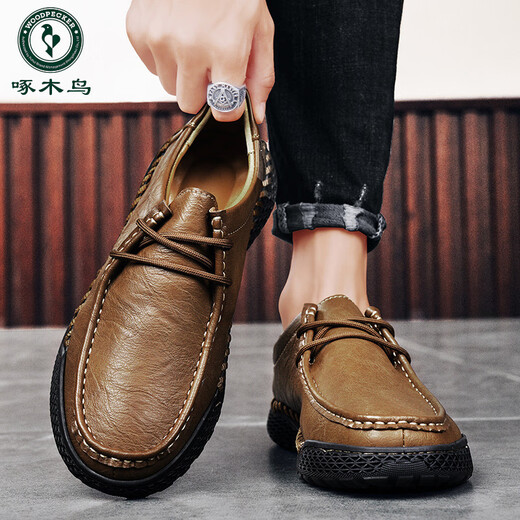
Woodpecker casual leather shoes for men 2025 new breathable outdoor sports lazy bean shoes genuine leather soft sole anti-slip trend black [9903 four seasons] 39