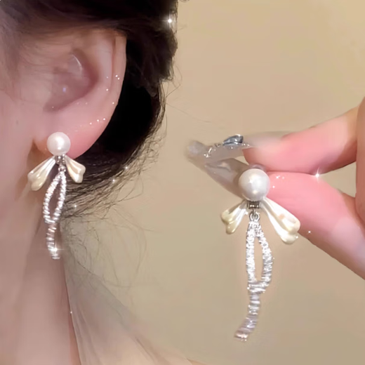 Bai Qixin 925 silver needle bow imitation pearl earrings for women light luxury niche high-end temperament earrings 2025 new earrings bow pearl tassel earrings