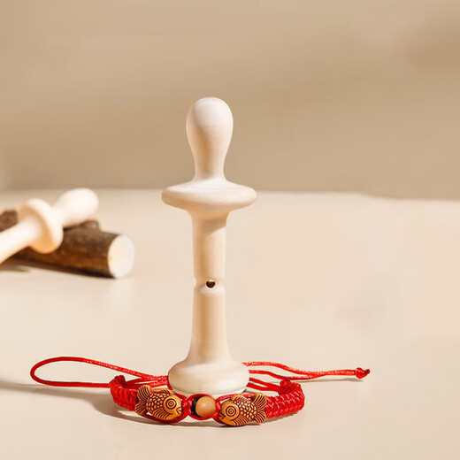 Bao's pepperwood molar stick toy baby teether for infants and young children to bite during the teething period to soothe the chewer with a red rope