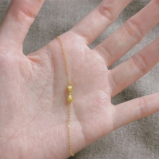 Yongsi 18K gold pure handmade gold bow tassel necklace feminine simple imitation 18k gold water drop clavicle chain