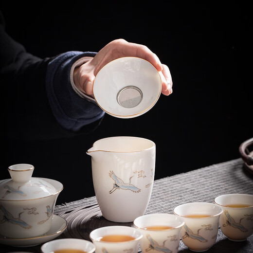 Yushige mutton-fat jade white porcelain Kung Fu tea set high-end simple home office reception ceramic bowl set of 8 cups with golden auspicious crane and auspicious orchid fragrance eight cups safety package 12 pieces (safety packaging) free tea towel