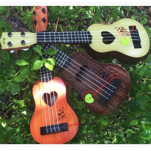 
Xian Huaida can play children's simulated guitar children's ukulele sends string-pull music scores for beginners toy musical instruments gift [44CM] Large size guitar-Acacia Mu