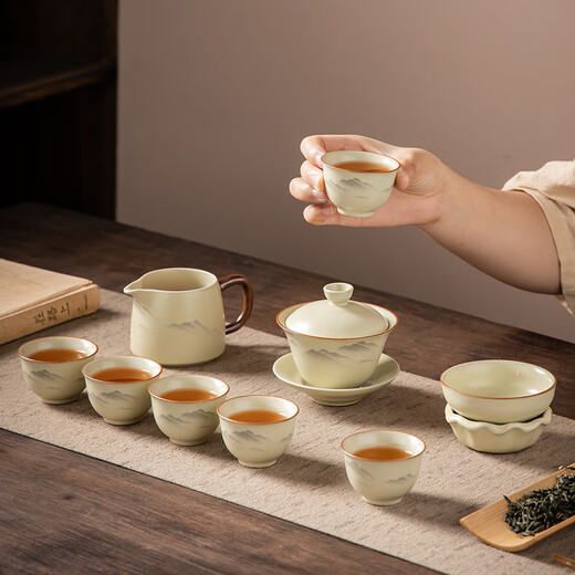 Complete set of gold inlaid jade tea set, imitation Song Dynasty Ru kiln open-piece ceramic Kung Fu tea set, high-end tea set for home use, ink painting distant mountains