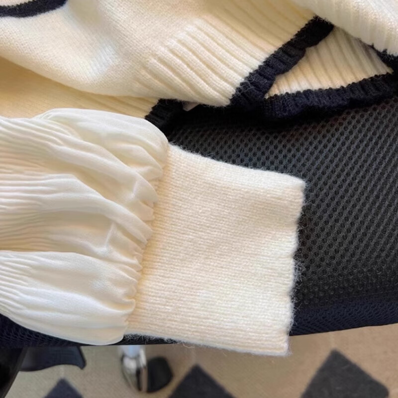 Yu Zhaolin French fake two-piece sweater for women spring autumn winter 2025 new women's contrast shirt striped puff sleeve sweater