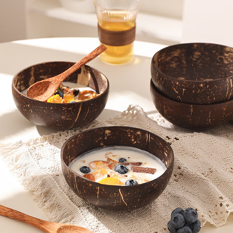 Badger yogurt bowl with spoon wooden dessert fruit salad home breakfast oatmeal natural coconut shell bowl