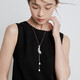 MIMORE pearl sweater chain women's high-end light luxury long necklace 2025 new accessories autumn and winter high-end tassel pendant