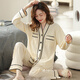 Pajamas pour femmes Quguo (Quguo) pour les manches longues en coton pur du printemps et de l'automne pour le cardigan d'automne entiment au printemps et à l'automne pour femmes en automne.
