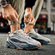 H8 Dad Chaussures Men 2025 Été Nouveau Luxury Coconut Chaussures 700 Couples Men et femmes Putian High-Enhancing Sports and Casual Shoes 700 Volcanic Ash (Version BT) 42