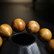 Mu century-old golden nanmu bracelet, men's and women's old material high-density Buddhist beads rosary and play bracelet, about 15mm