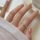Fan Mili Anillo de moda apilado para mujeres Temperamento dulce y fresco Personalidad elegante Luz de lujo Luxury Open Finger anillo versátil Índice Tendencia de anillo de dedo JZ6636 Apertura ajustable