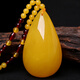 Caihe beeswax color pendant chicken fat yellow Ping An Wu Shi brand sweater chain imitation amber for men and women 1. Water drop pendant