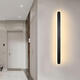 FENGLANQ light luxury minimalist one-word long wall lamp living room grille line TV background wall lamp simple bedroom bedside lamp black acrylic 20cm warm light