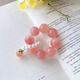 Little Red Book's same style peach finger twisted beads around the ring fairy peach blossom decompression niche design student beads orlan bell flower hand twisted beads