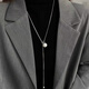 Lindo collar Keduo Pull-Pull para mujeres con diseño ligero de nicho de lujo Collar largo Otoño e Invierno Cabilar de la cadena de suéter de moda Collar de perla de imitación de plata.