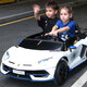 Join hands with an extra-large two-seater Lamborghini children's electric car toy that can sit on a baby's remote-controlled child stroller. Upgraded green full-featured + MP4 + 12A ultra-powerful battery, tug + portable charging + hydraulic butterfly wing door