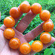 Holy glass is similar to natural chicken fat, yellow old beeswax bracelet, large amber Buddha bead bracelet for men and women, floating in salt water and fluorescent, bead diameter 16mm, 14 beads