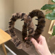 Shusu big wave leopard print plush headband high skull Korean lace teeth anti-slip hair pressure autumn and winter face wash headband broken hair arrangement leopard print plush headband light color