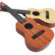 Los niños de Zkhe pueden tocar ukelele para juguetes para principiantes guitar