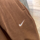 耐克（Nike）裤子女裤2025春季新款款时尚潮流舒适宽松透气休闲跑步训练长裤 HQ4877-259惊喜可可色 摇粒绒 M