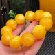 DL 1998 Fat Donglai same style chicken oil yellow beeswax bracelet natural l floating flower old boys and girls round bead couple amber bracelet diameter 18mm floating flower bracelet men's style