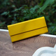 Select the new glasses box for the first time, triangle foldable portable, simple and personalized sunglasses storage box for men and women, green glasses delivery cloth