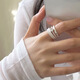 Fan Mili Anillo de moda apilado para mujeres Temperamento dulce y fresco Personalidad elegante Luz de lujo Luxury Open Finger anillo versátil Índice Tendencia de anillo de dedo JZ6636 Apertura ajustable
