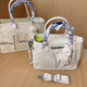 BOIJING BOLSO MAMANA JAPÍA MATRA Y BEBÉ 2025 NUEVA Corriente bolsas colgantes para bebés Baby Baby Artefacto bolso saliendo a almacenar estilos nuevos y viejos al azar blanco tamaño mediano ajustable ajustable