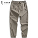 Danse avec le loup [trois défenses] Pantalon décontracté à séchage rapide pour hommes 2025 Été Nouvelle taille élastique Pantalage de pied de banlieue de banlieue 4005 kaki 701 m (170)