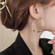 DL 1998 Fat Donglai same style 18k gold large hoop earrings large hoop earrings for women unique exaggerated temperament light luxury plain hoop earrings 18k gold color Möbius earrings