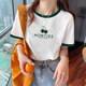 Xuanmo Shandong Jimo T-Shirt T-Shirt Sommer 2025 Neues kontrastierendes T-Shirt für Frauen mit kurzärärmigem, vielseitigem und modischen losen und schlanken KC693 Black Collar S