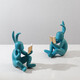 
Simple reading rabbit ornaments cartoon living room wine cabinet study room wall cabinet TV display cabinet home decoration light luxury reading rabbit
